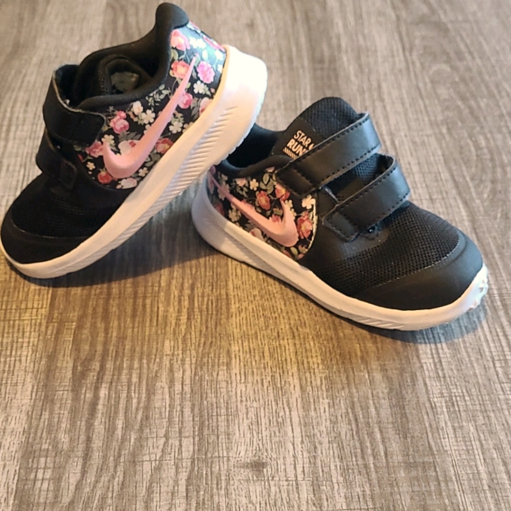 Girl Nike sneakers.